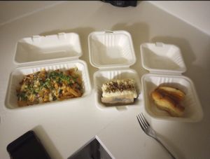 Loaded fries, cake, and a half eaten hot dog because I couldn't wait ❤️ at Sealevel City Vegan Diner in Wilmington