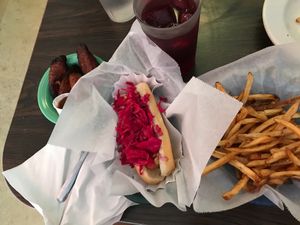 Kimchi vegan hot dog, fried plantains, fries, raspberry green tea  at Sealevel City Vegan Diner in Wilmington