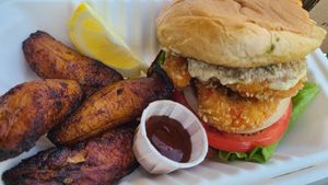 Shrimp burger with tartar sauce and plantains  at Sealevel City Vegan Diner in Wilmington