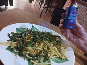 Fried potatoes,  peppers and hot sauce! 💚 at EL CAÑIZO de Carmen in Albacete