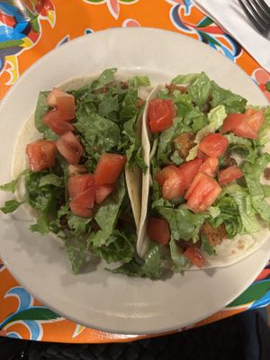 Tofu a la Mexicana soft flour tacos!
Tofu sautéed with tomatoes, garlic, onions, and jalapeños. Topped with lettuce and tomatoes    at Carrburritos in Chapel Hill
