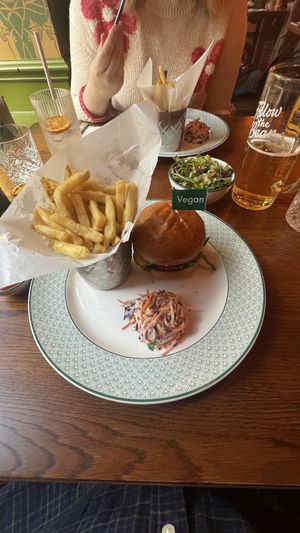 Vegan burger with slaw and fries plus a side salad  at Cosy Club  in Oxford