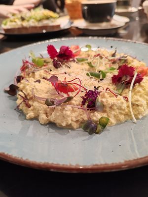 Scrambled tofu comes with a basket of bread, very filling itself already at Al Ponte Prague in Prague