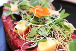 *vegan option Bread with beetroot spread, veg Greek cheese at Al Ponte Prague in Prague