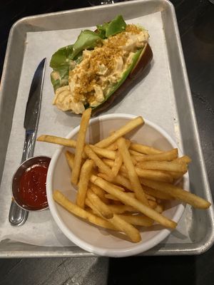 Lobster roll with fries  at Blue Atlas Restaurant and Market  in Richmond