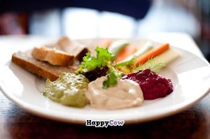 Dips plate with beetroot dip, aubergine & tahini, and chard & walnut pesto with crudites and Judges bread - photo by Daniela Exley at Moose's Kitchen in Hastings