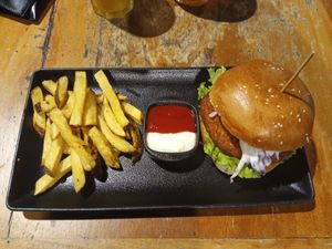 "vegan" burger, with ketchup and mayo dip for the fries at Post Office Food and Beer in Puerto Baquerizo Moreno