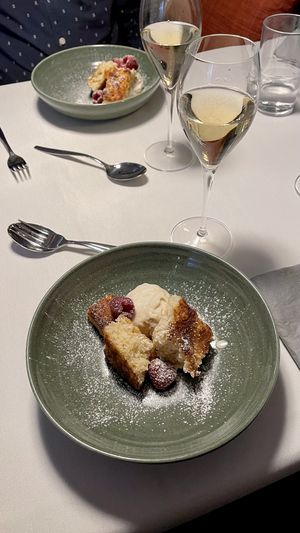 Almond cake, rasberries and salted caramel icecream.  at Ravintola Pikku Hukka in Helsinki
