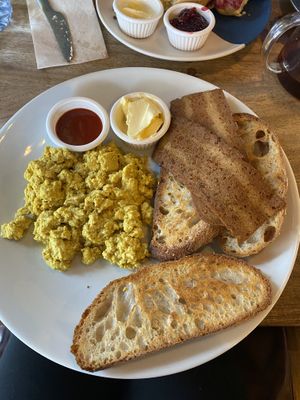 Scrambled tofu toast and bacon   at Hustle in Belfast