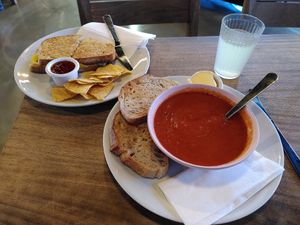 From top left: chicken sandwich and tomato basil soup at Hustle in Belfast