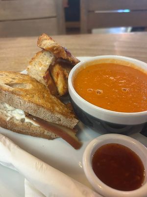 Toastie with bacon and chicken schnizel and soup of the day at Hustle in Belfast