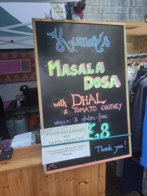 Price board at Kumar's Dosa Bar in Totnes