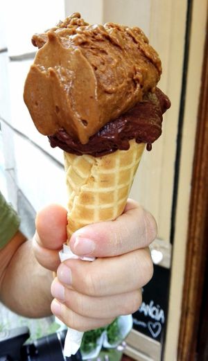 This was coffee flavour and some kind of hazelnut and chocolate mix typical from Torino which they call "gianduia". Just out of this world! at Il Gelato Amico - San Massimo in Turin