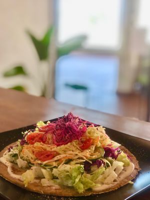 inner you café - all homemade, 100% gluten free, unique plant-based vegan food, cakes & fresh juices - organic flat bread with coleslaw and fresh veggies  at inner you vegan in Tenerife