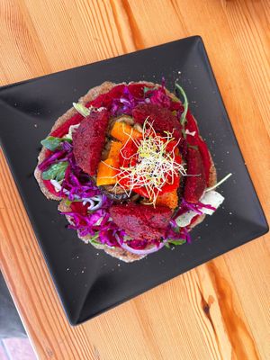 Flatbread with beetroot hummus and falafel at inner you vegan in Tenerife
