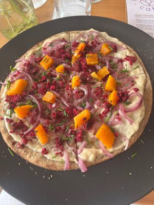 Pumpkin tarte flambé with cashew cream  at inner you vegan in Tenerife