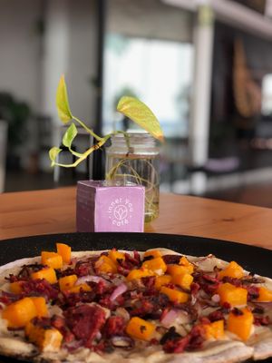 Tarte Flambé with pumpkin, onions and veggie meat at inner you vegan in Tenerife