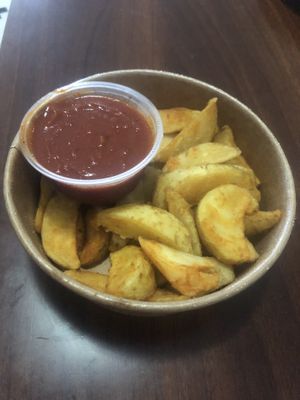 Potato wedges with pizza sauce   at Papa Murphy's - Al Raha Mall in Abu Dhabi