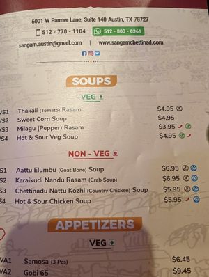 Vegan dishes marked with green leaf at Sangam Chettinad Indian Cuisine in Austin