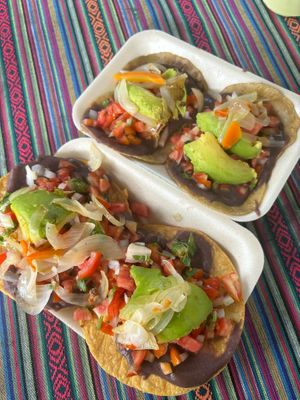 Vegetarian (but also vegan) tostadas and tacos. 30Q for all this food. at Tacos Los Peches in Flores