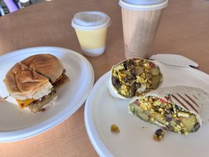 Vegan breakfast sandwich and vegan breakfast burrito, with coffee. ☕️  at Bridge & Tunnel Coffee - Cafe & Roastery in Asheville