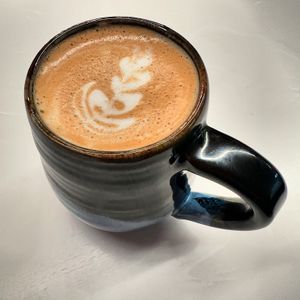 Oat milk cappuccino   at Bridge & Tunnel Coffee - Cafe & Roastery in Asheville