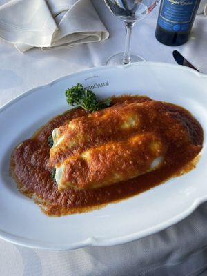 Cannelloni stuffed with vegetables, vegan provolone and with tomato sauce  at Puerto Cristal in Buenos Aires