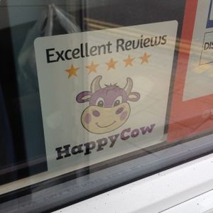 The Happy Cow Sticker  at The Good Apple Cafe in Sunderland