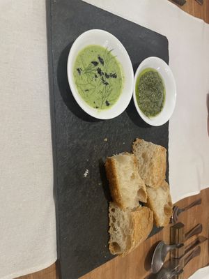 Homemade bread with herb emulsions   at Tierra Restaurante  in Sucre