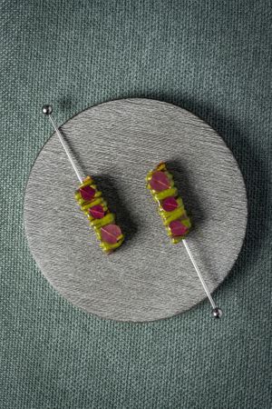 Deep Fried Potato Cake with Black Garlic and Pesto at MIA Bangkok in Bangkok