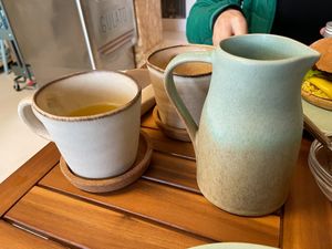 Tea in lovely pottery at Anguilla Surf Café in Melides