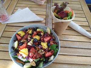 Veggies/fruits salad and wrap with falafels at Anguilla Surf Café in Melides