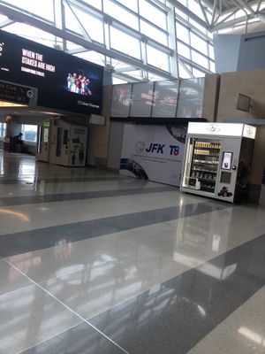 In terminal 8, close to gate 12. As of July 2024 no tap and pay, only card swipe at JFK- Farmer's Fridge -T8 in Queens