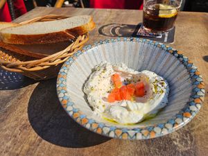 Labaneh with tomatoes, zaatar and olive oil, with Challah bread (9.50€) at TWO SIX NINE in Frankfurt