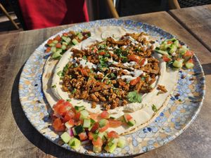 Tel Aviv mix: Shawarma with mince, portobello + onions, on laffa bread with hummus, salad, tahini and harissa sauce (18€) at TWO SIX NINE in Frankfurt