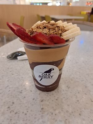 As many toppings as you want. I chose strawberries, banana, granola, peanut butter, pumpkin and chia seeds. at Oakberry - Mall Of the Emirates in Dubai