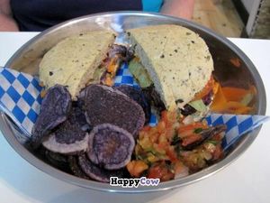 Purple Taro Portobello Sandwich with chips and salsa at Propulsion Vegan Canteen in Montreal