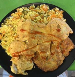 Rice with chickpea flour fried mushrooms  at Vege Fast Food in Split