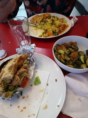 Soy burger, fried tofu with rice and side dish of vegetables. at Vege Fast Food in Split