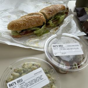 Potato salad, cherry tomatoes with cashew cheese, & the meadow soprano sub.  at B&T's Deli in Santa Monica