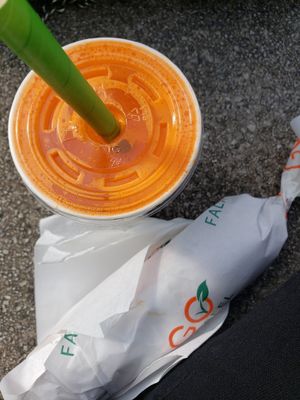 Orange, carrot and lime juice with a large wrap. at Go Falafel - Piccadilly Gardens in Manchester