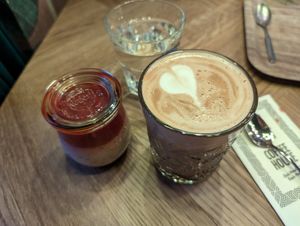 Latte with oat milk and chia pudding at Coffee House Levi in Sirkka