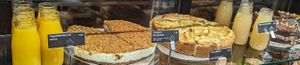 The caramel and the apple cake, the veggie sandwich and the chia pudding are marked as vegan at Coffee House Levi in Sirkka