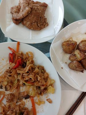 Amazing noodles, tasty potatoes and incredible vegan "meat" made with soy at Tian Jie in Nazare