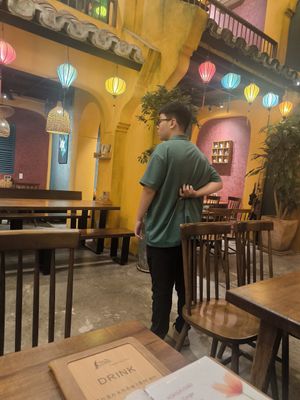 So much attention to decorations and he dresses like that shaking his hands with restlessness and awkwardness at Metta Vegetarian in Ho Chi Minh City