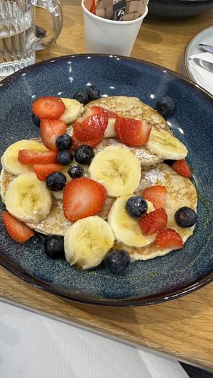 Pancakes with fruit  at Rolling Oats in London