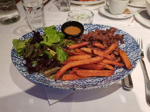 Vegan chicken with batat and salad at Mali Vrabac in Belgrade