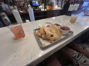 House chips and chunky salsa. Margaritas 😋   at Agave & Rye in Louisville