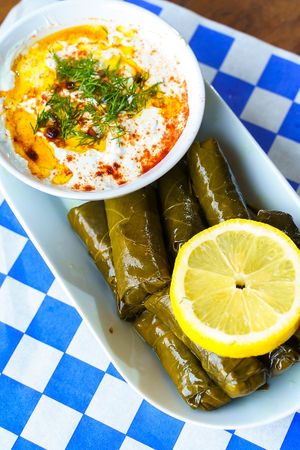 grape leaves stuffed with rice and herbs. You can order a sauce for extra pleasure! at Eat Like A Greek  in Edgewood