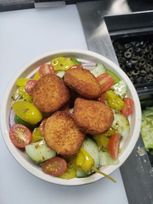 Vegan salad with vegan nuggets or falafel, lettuce , cherry tomatoes ,cucumbers, peperochini peppers , banana peppers , green peppers! at Eat Like A Greek  in Edgewood